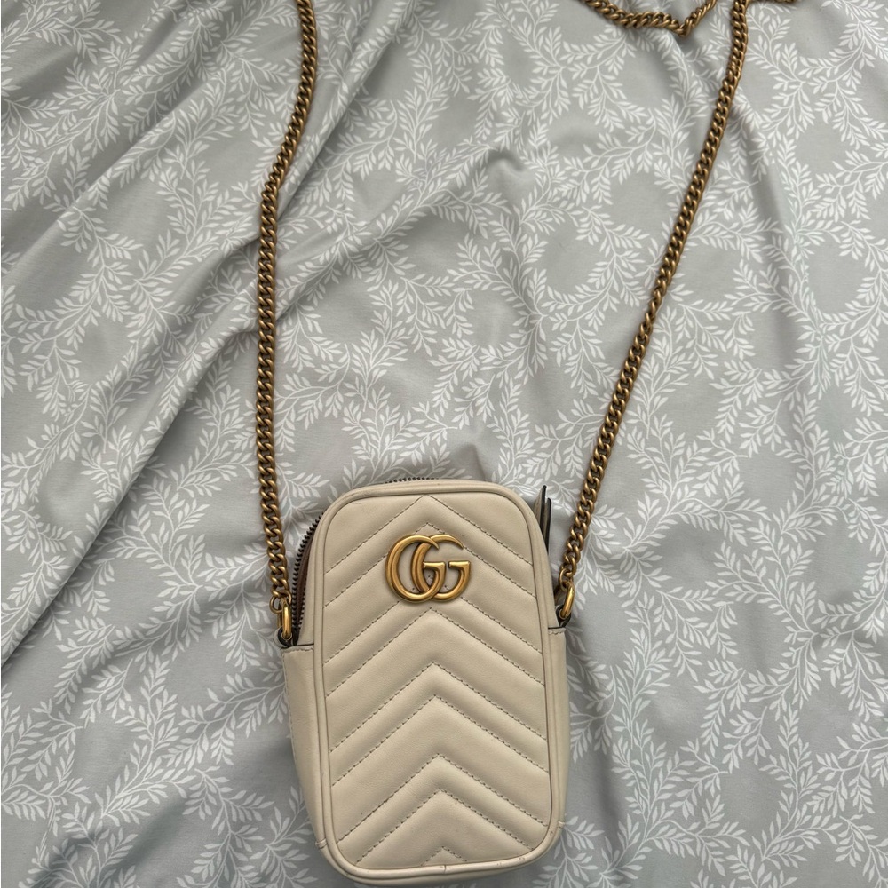 White vertical GG marmont mini Gucci bag